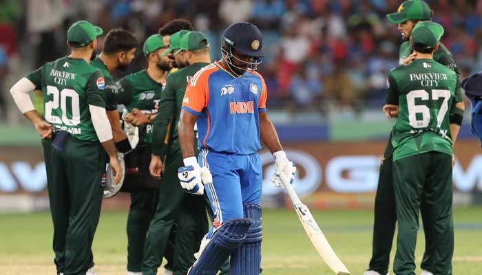 1345455_3536385_indias-sanju-samson-walks-after-being-bowled-out-by-pakistans-haris-rauf-in-asia-cup-match-at-dubai-international-cricket-stadium-dubai-uae-september-21-2025_-reuters_updates Indias Sanju Samson walks after being bowled out by Pakistans Haris Rauf in Asia Cup match at Dubai International Cricket Stadium, Dubai, UAE, September 21, 2025. – Reuters