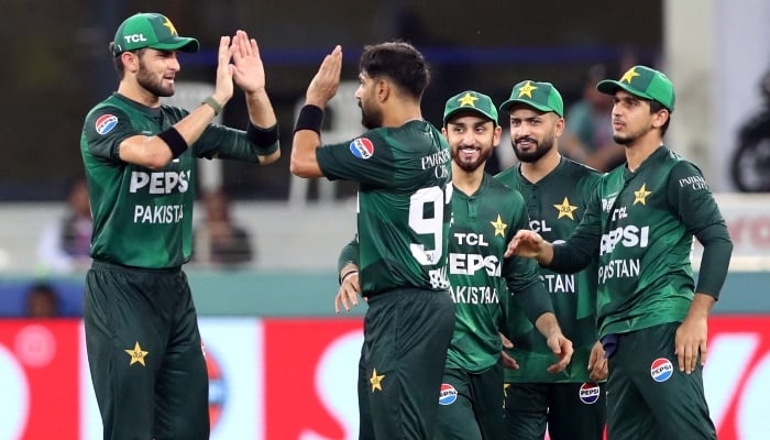 1345536_1206020_team-pak_updates Haris Rauf celebrates with teammates after taking the wicket of Indias Suryakumar Yadav at Dubai International Cricket Stadium on September 21, 2025. — Reuters