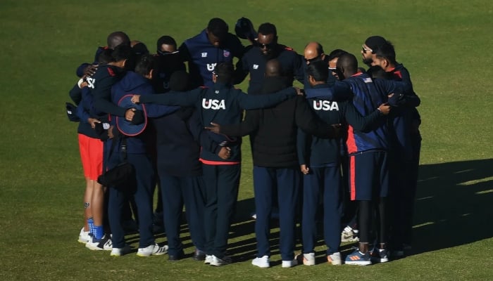 1345960_4285125_team-us_updates The USA players get into a huddle before the toss, Zimbabwe vs USA, ICC World Cup Qualifier, Harare, June 26, 2023. — ICC