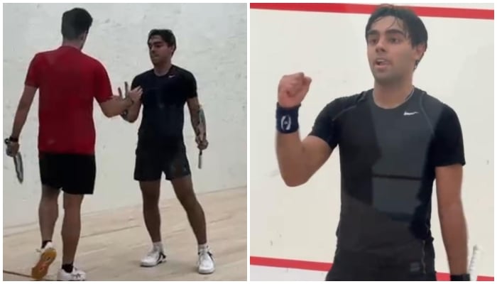 Pakistani squash player posing after defeating counterpart. — Reporter