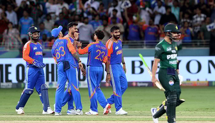 1346867_7702025_farhan_updates Indias Kuldeep Yadav celebrates with teammates after taking the wicket of Pakistans Hasan Nawaz during their Asia Cup encounter at Dubai International Cricket Stadium, Dubai, United Arab Emirates, September 14, 2025. — Reuters