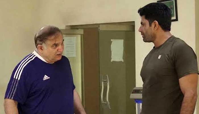 1350070_4573898_arshad-nadeem-and-salman-iqbal-butt-3_updates This file photo shows ace javelin thrower Arshad Nadeem (right) and his coach Salman Iqbal Butt. — Reporter