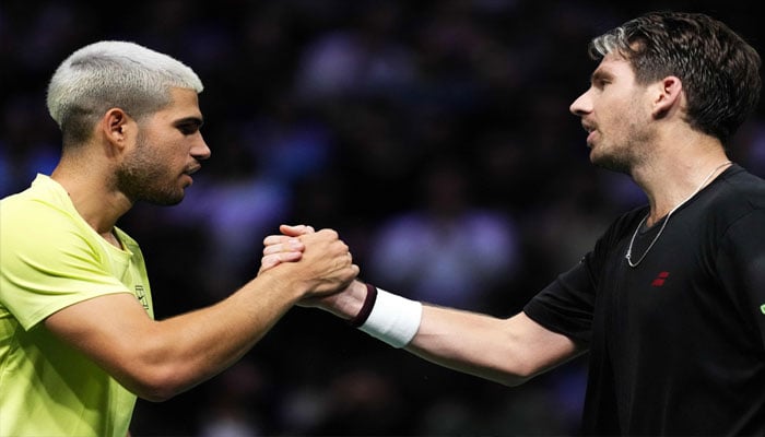 1354375_6192802_tennis-2_updates Winner Britains Cameron Norrie (right) shakes hands with Spains Carlos Alcaraz after their mens singles match on day two of the Paris ATP Masters 1000 tennis tournament at the Paris La Défense Arena in Nanterre, on the outskirts of Paris, on October 28, 2025. — AFP
