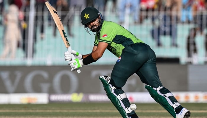 1356643_3422598_babar-azam-3_updates Pakistans Babar Azam plays a shot during the ODI cricket match against South Africa at the Iqbal Stadium in Faisalabad, November 6, 2025. — AFP