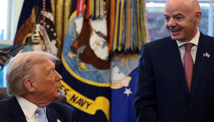 1358691_2443033_untitled-1_updates US President Donald Trump sits next to FIFA President Gianni Infantino, as he meets with the White House Task Force on the FIFA World Cup 2026 in the Oval Office at the White House in Washington, DC, US, November 17, 2025. — Reuters