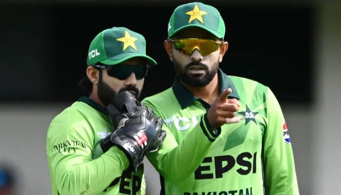 Mohammad Rizwan and Babar Azam during game one of the Mens ODI series between New Zealand and Pakistan at McLean Park, on March 29, 2025, in Napier. - AFP