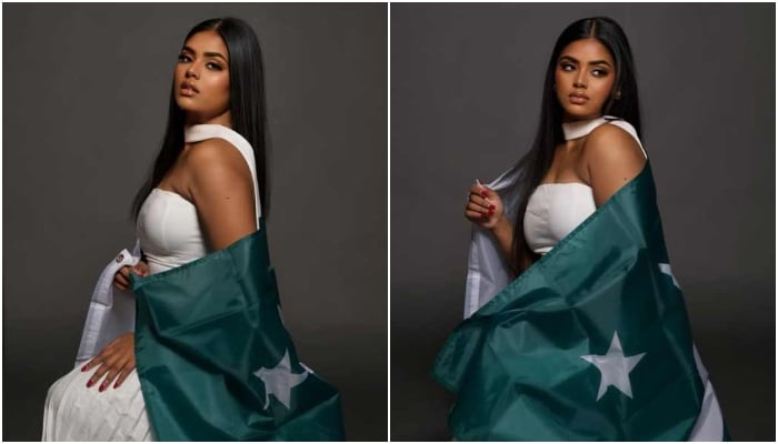 Roma Riaz poses for a photograph drapping Pakistani flag. —Instagram/@romariaz_official