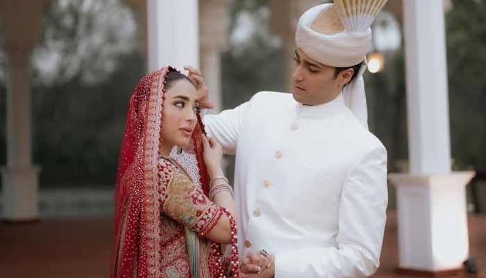 Punjab Chief Minister Maryam Nawaz son, Junaid Safdar poses with wife Shanzey Ali on their wedding ceremony on January 17, 2026, in Jati Umra, Lahore. — Instagram/irfanahson